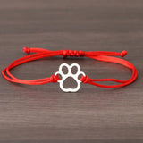 Pulseira Ajustável com Patinha em Cordão Preto e Vermelho