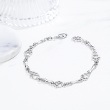 Pulseira com Charms de Patas de Cão e Ossos Feita de Prata Pura